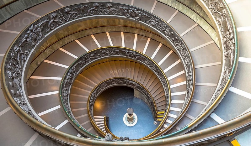ROME, ITALY - CIRCA SEPTEMBER 2020: the famous spiral staircase with double helix. Vatican Museum, made by Giuseppe Momo in 1932