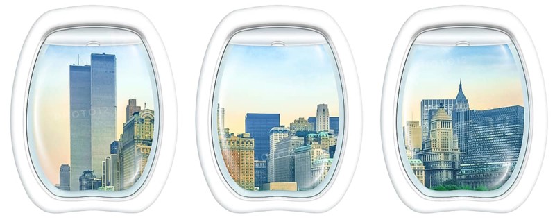 Three plane windows on New York City with World Trade Center and Twin Towers, Manhattan, United States, from a plane on the porthole windows. Copy space