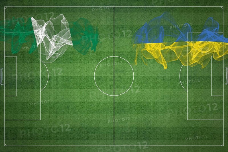 Nigeria vs Ukraine Soccer Match, national colors, national flags, soccer field, football game, Competition concept, Copy space