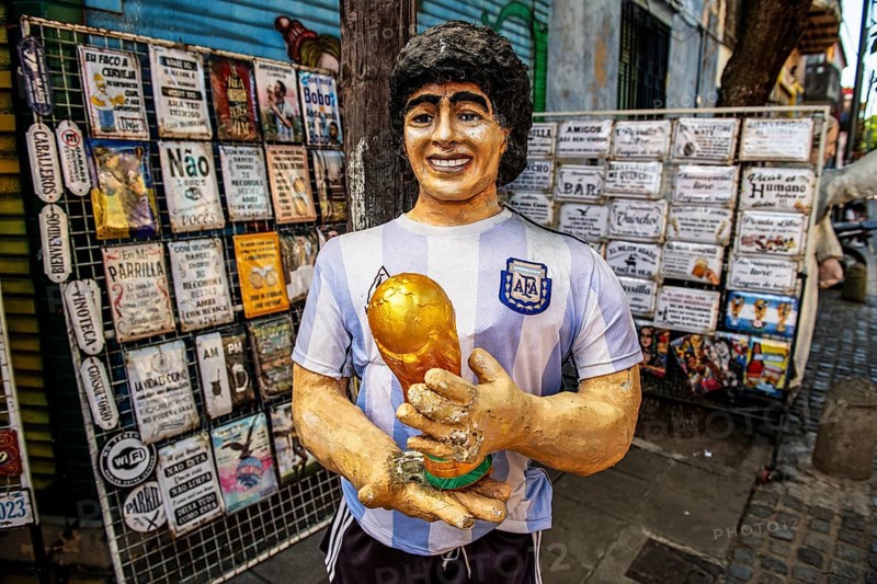Statue of Diego Maradonna with football World Cup trophy in La Boca, Buenos Aires, Argentina