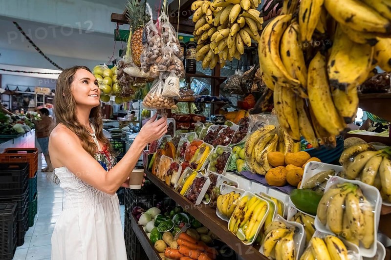 A lovely young woman explores a charming shop in Telchec, Mexico, nestled in the Yucatan Peninsula's quaint town, captivated by its rustic allure, Telchec, Mexico