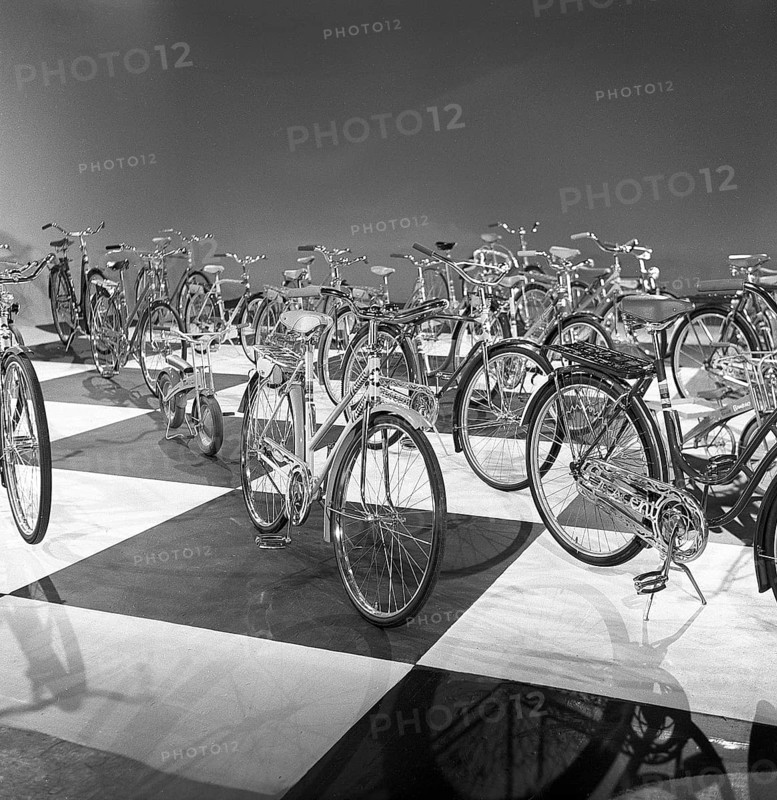 1950s bicycles. Swedish bicycle manufacturer Nymanbolaget built their first bicycles 1888. Here in the 1950s the company was one of the leading bicycle manufacturers in Europe. The picture shows bicycles of different models when making a advertisment 1958. The company marketed itself as producing the World champion bike. Sweden 1958 ref CV9-4
