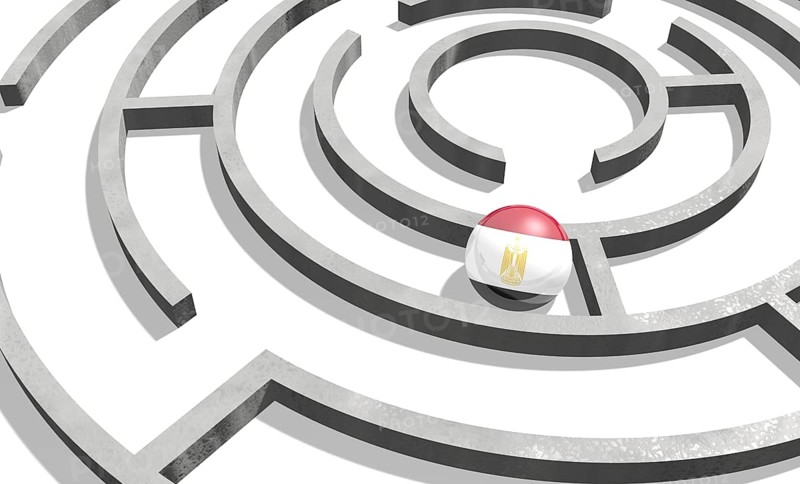 Image relative to politic situation in Egypt. National flag textured sphere in labyrinth. 3d rendering