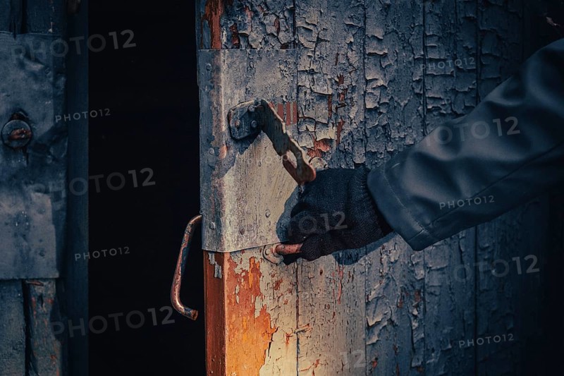 Fictional movie poster. People with flashlights, masks and protective clothing inspect old house. Infected epidemic people in destroyed home. Dark gloomy environment, filter processing
