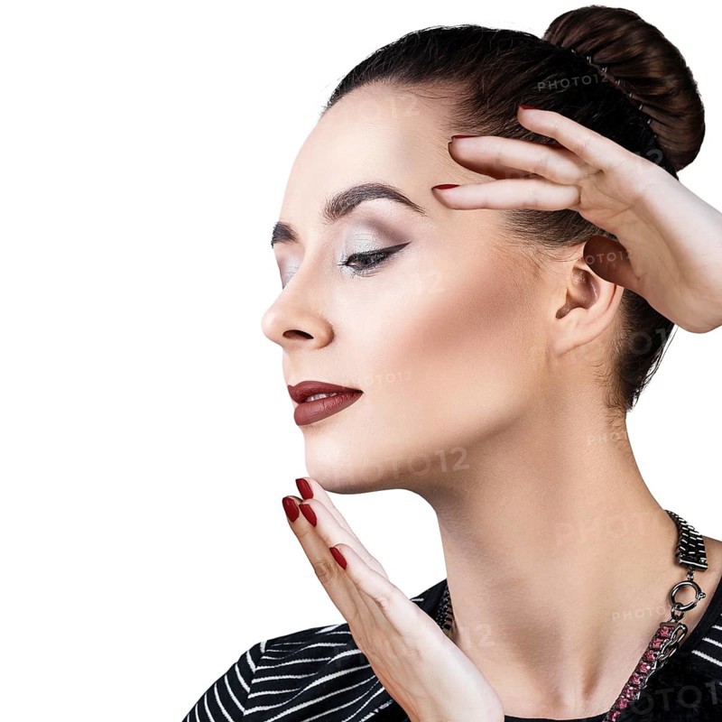 Portrait of beautiful woman with bright makeup. Isolated on white