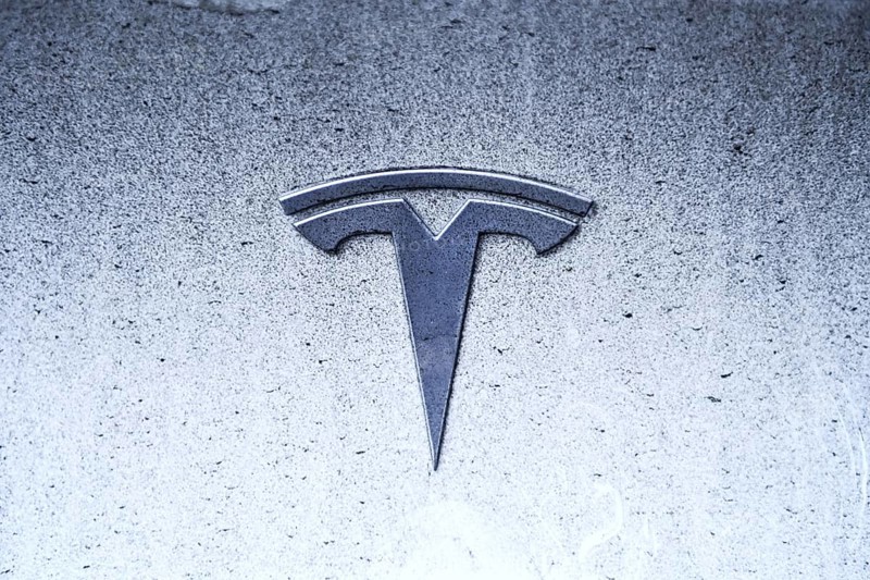 Tesla logo on an electric car