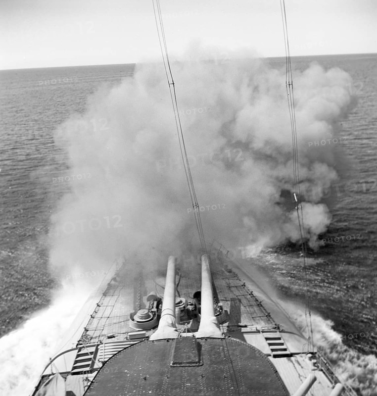 During World war II. The war ship Sverige during navy exercises at sea. The front cannons being fired and smoke is seen coming out of them. Sweden june 1940. Kristoffersson ref 141