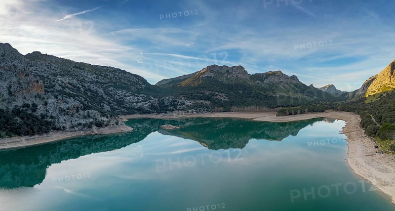 An aerial view of the picturesque Gorg Blau mountain lake and reservoir in the Serra de Tramuntana mountains of northern Mallorca