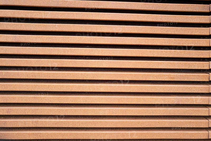 Rusted metal wall in the sun