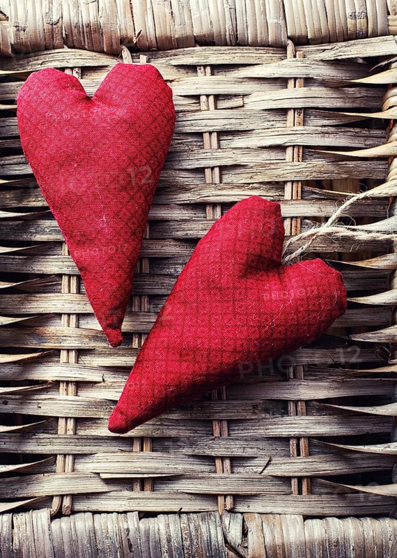 Handmade heart fabric Valentine', s day on wooden table