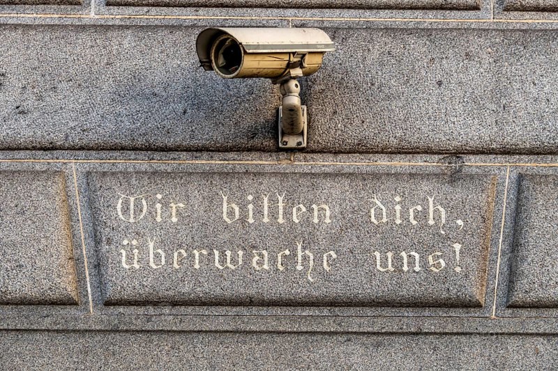 Surveillance camera on a building, symbol for surveillance, internal security, control, data protection Austria