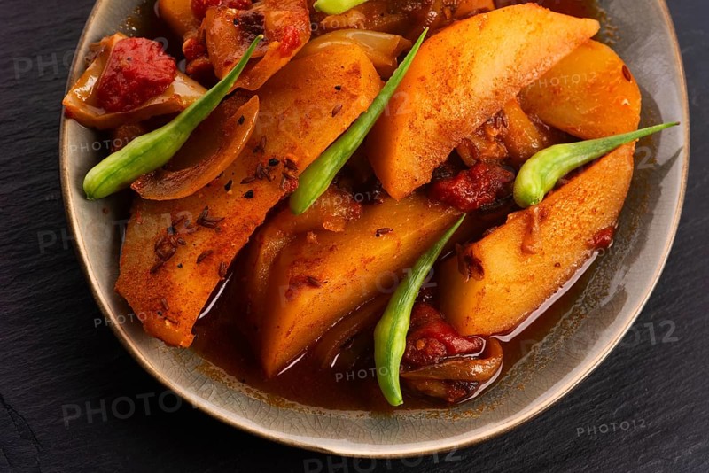 Fried potatoes with paprika sauce. crispy fried patata bravas, fried potatoes with smoked paprika sauce
