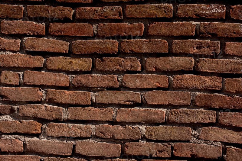 Old vintage grunge brick wall background texture with place for text