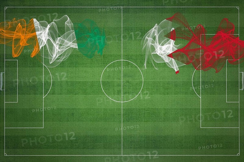 Ivory Coast vs Bahrain Soccer Match, national colors, national flags, soccer field, football game, Competition concept, Copy space