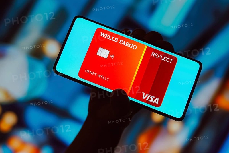 In this photo illustration, the Wells Fargo Reflect Card is displayed on a smartphone screen