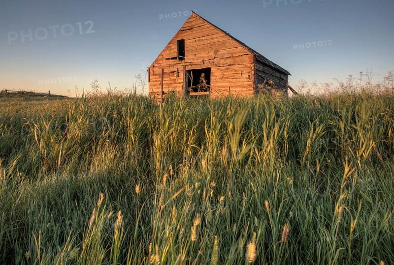 Abandoned Farmhouse Saskatchewan Canada sunset and prairie view