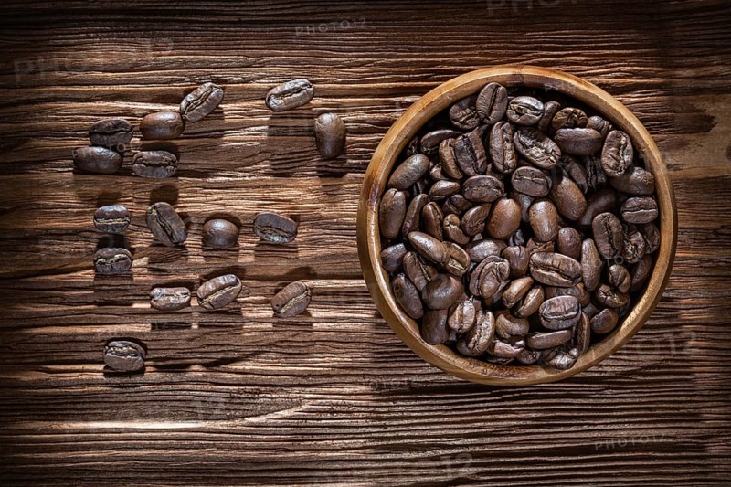 Coffee crops bowl on vintage wooden board