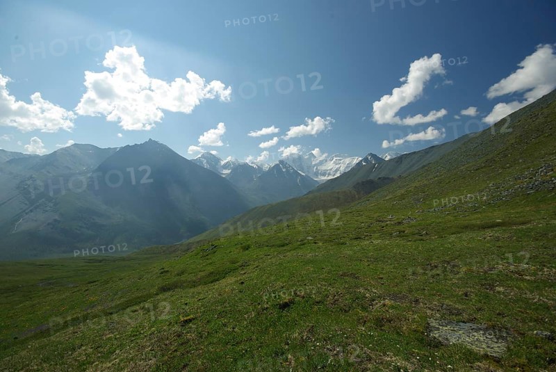 Mountain landscape. Highlands, the mountain peaks, gorges and valleys. The stones on the slopes
