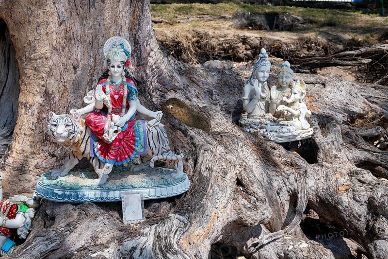 Small, private Hindu god statues on the beach, Indian Ocean, island, Mauritius