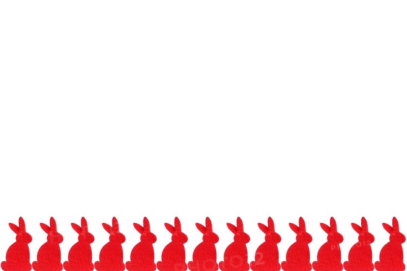 Red Easter bunnies in a row - isolated on white background Row of red easter bunnies - isolated on white background