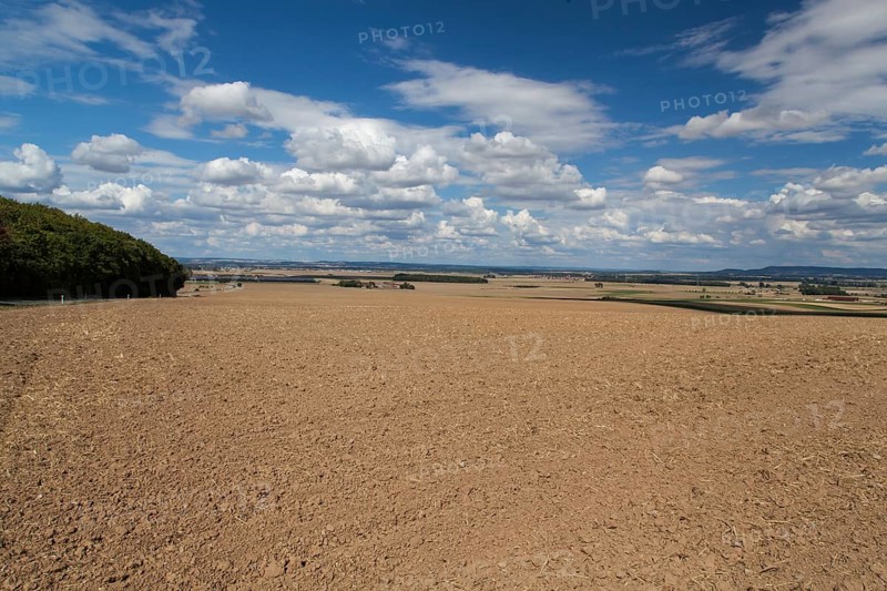 View from the Sonnenberg near Gaibach into the Schweinfurt countryside near Kolitzheim and the foothills of the Steigerwald in the background, Lower Franconia, Bavaria, Germany