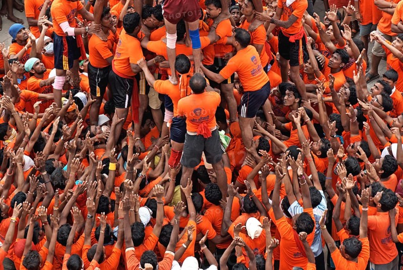 Boys arranging human pyramid on gokulashtami, janmashtami, Bombay Mumbai, Maharashtra, India NO MR 14-August-2009