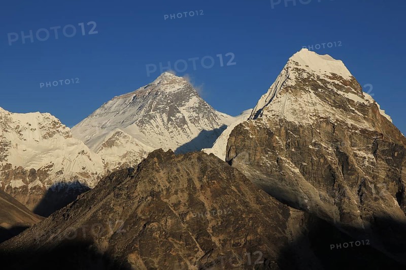 Mt Everest lit by golden evening light, Nepal