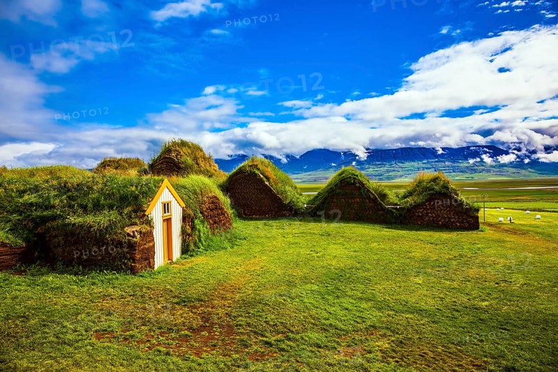 Ethnographic Museum-estate Glaumbaer, Iceland. The picturesque village of old houses covered with turf and grass. The concept of the cultural and historical tourism