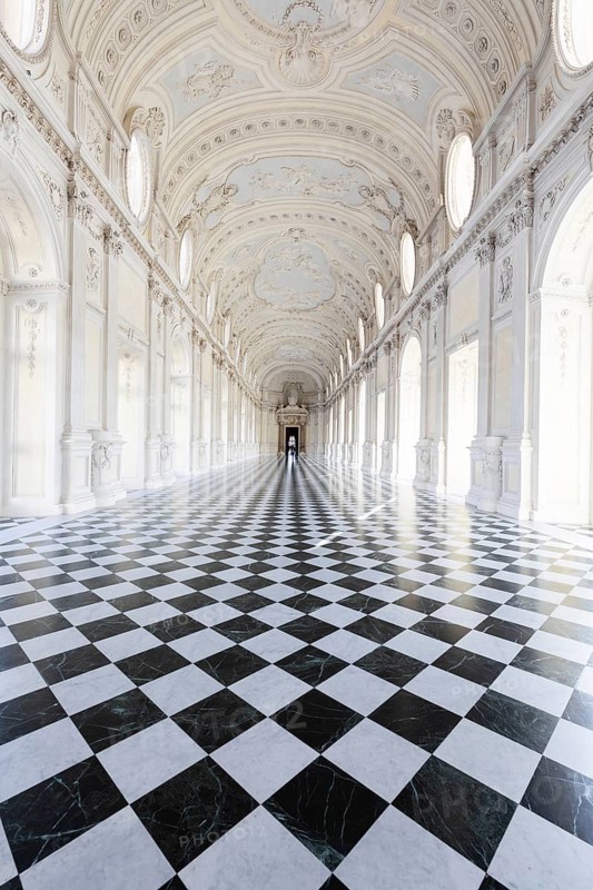 Reggia di Venaria Reale, Italy, October 2022: corridor perspective, luxury marble, gallery and windows, Royal palace