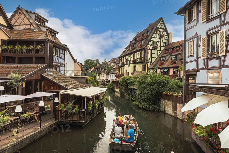 Little Venice (La Petite Venise), tourists enjoying a boat trip on the canal, Colmar, Alsace, Grand Est, France