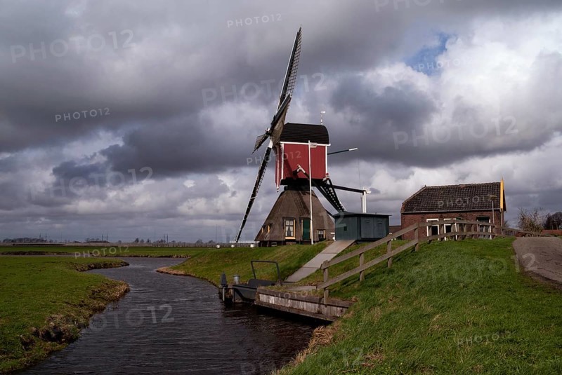 Heavy clouds above the Hoogmadese windmill near the Dutch village Hoogmade