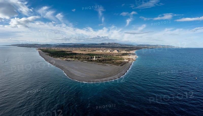 A panorama drone landscape view of Punta Alice beach and lighthouse in Calabria