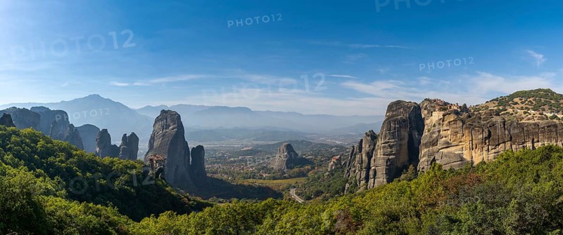 Panorama landscape view of the Meteora rock formations with the Saint Nikolaos monastery