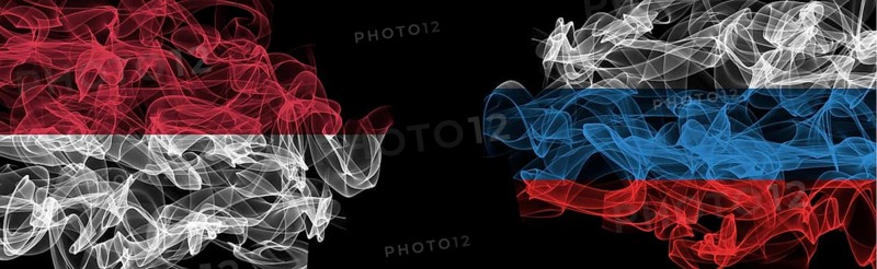 Flags of Indonesia and Russia on black background, Indonesia vs Russia smoke flags
