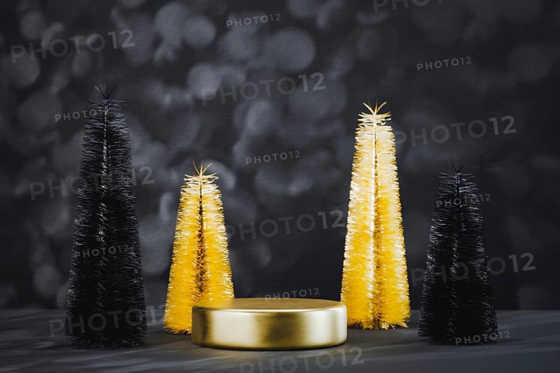 Podium pedestal product mockup display with miniature Christmas trees in black and gold, 3d illustration