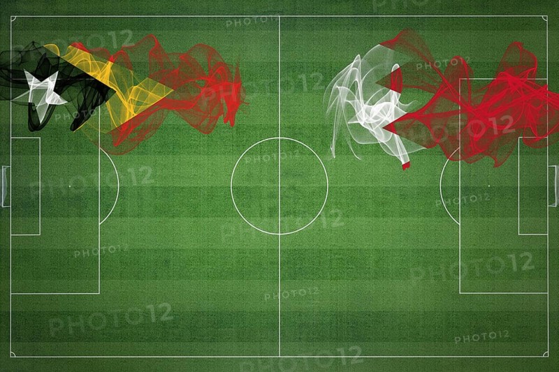 East Timor vs Bahrain Soccer Match, national colors, national flags, soccer field, football game, Competition concept, Copy space