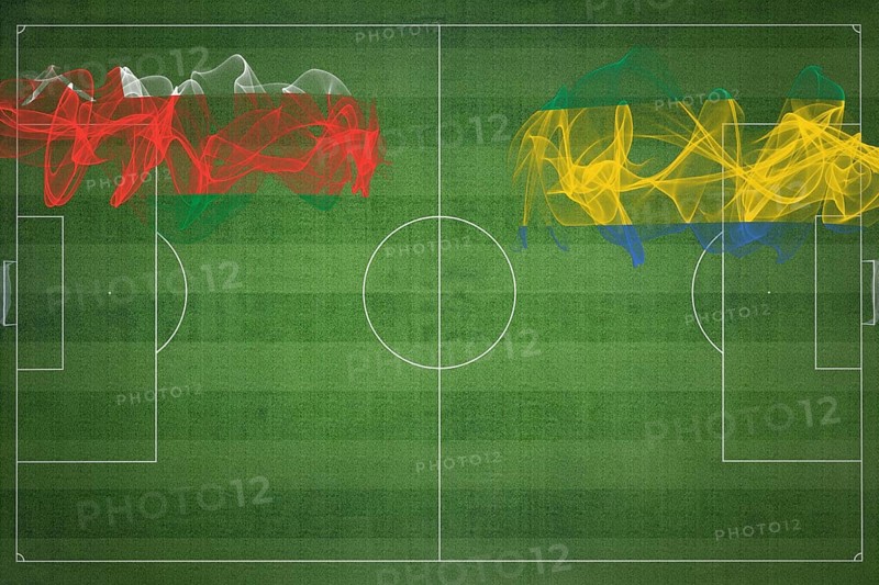 Oman vs Gabon Soccer Match, national colors, national flags, soccer field, football game, Competition concept, Copy space