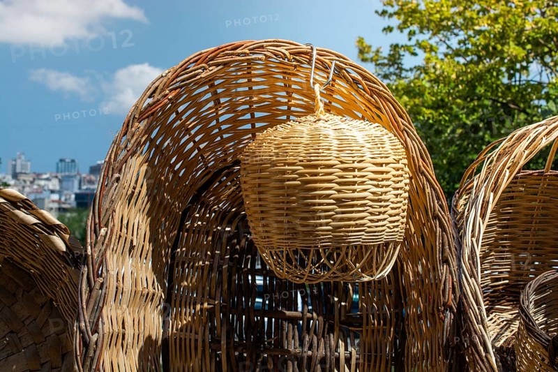 Empty wicker baskets are seein a market place