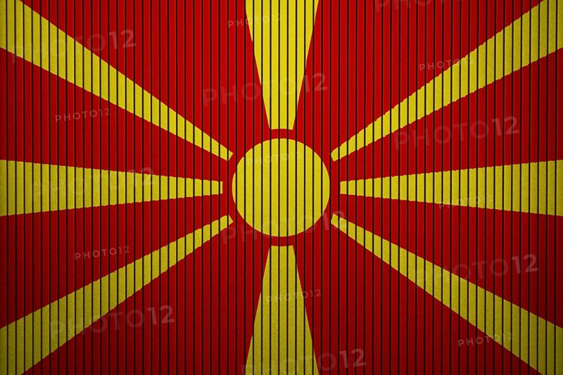 Macedonia Flag painted on the cracked grunge concrete wall