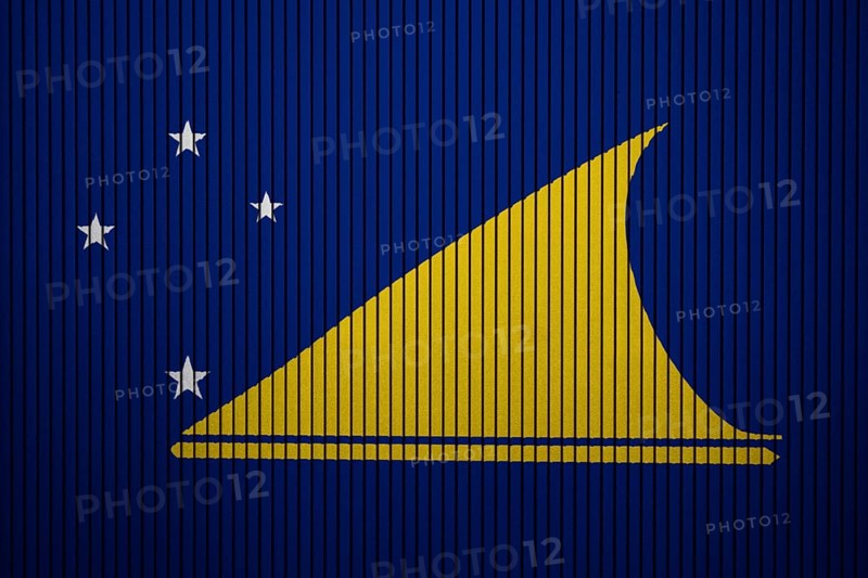 Tokelau Flag painted on the cracked grunge concrete wall