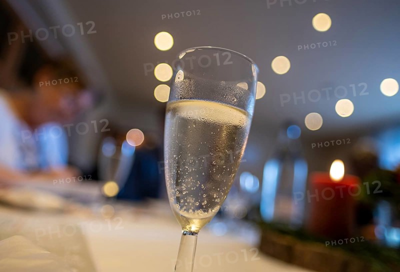 Filled champagne glass at a birthday party, Germany