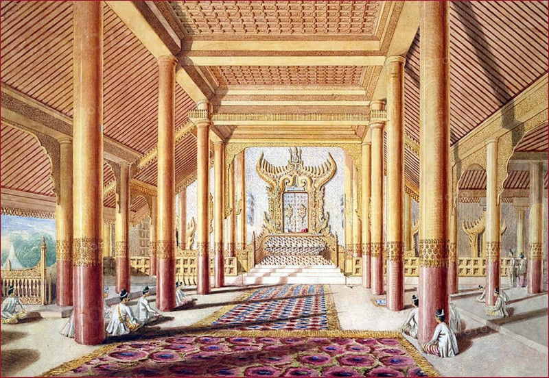 In 1855 the British sent a diplomatic mission to the court of King Mindon Min (r.1853-1878). Grant (1813-1880) was sent as the official artist of the mission. Together with a privately-printed book of notes, his drawings give a vivid account of the journey, and a number were used for illustrations to Henry Yule's ‘A Narrative of the mission sent by the Governor General of India to the Court of Ava in 1855' published in 1858.<br/><br/> Grant wrote that the audience chamber represented in this painting was 'called ‘Thee-ha-thuna-yàzà-pulleng', and used only on occasions of importance...the blaze and brilliancy of the colonnaded hall, with its choir and transepts, its elaborately ornate and singular throne, glittering in mosaic and gold...'<br/><br/> Today, little remains of the palace buildings at Amarapura