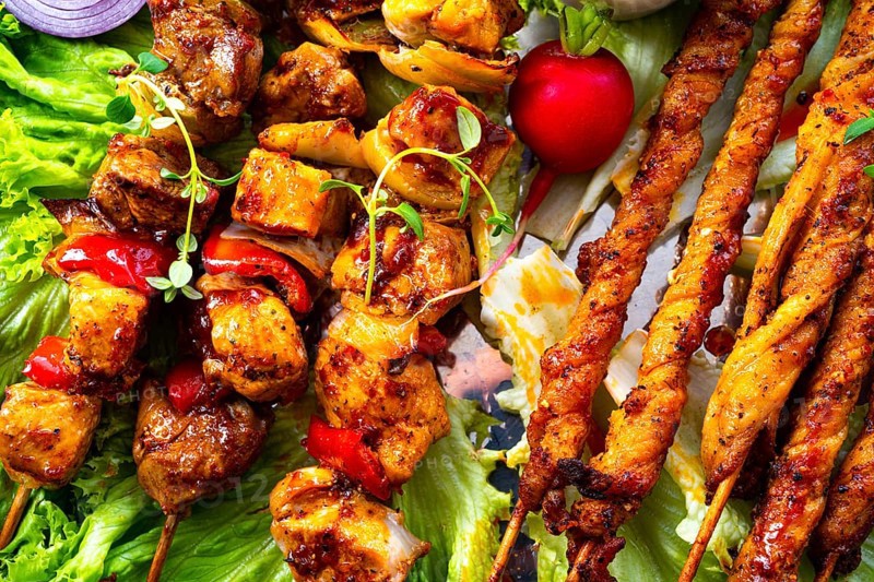 Grilled szaszlyk and meatballs with green salad