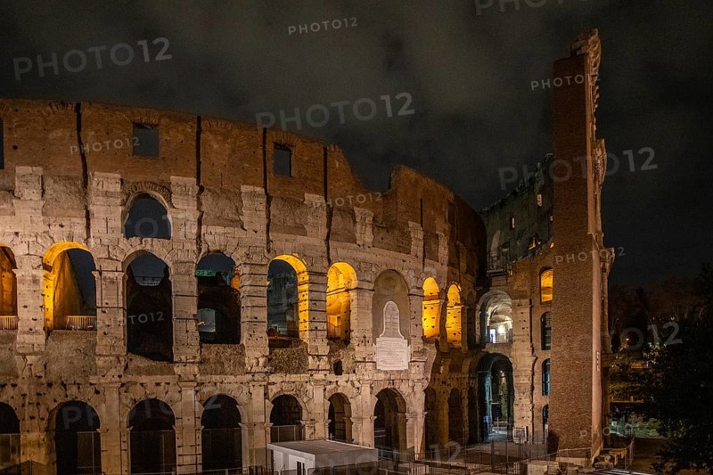 The Colosseum, famous and unique historical building of the Eternal City. View in the morning with great lighting, light installation. no people, Rome, Italy