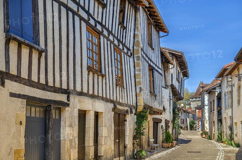 Street with historical houses in Saint-Jean-de-Cole, Dordogne departement, France