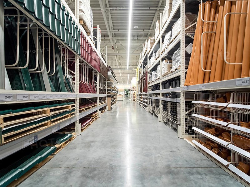 Store for home improvement and DIY. Warehouse aisle of building materials in industiral store. Shallow DOF