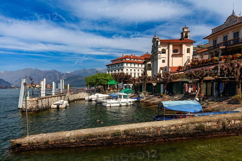 View of the landing stage with Palazzo Boromeo, Borromean Island Isola Bella in Lake Maggiore, Piedmont, Italy