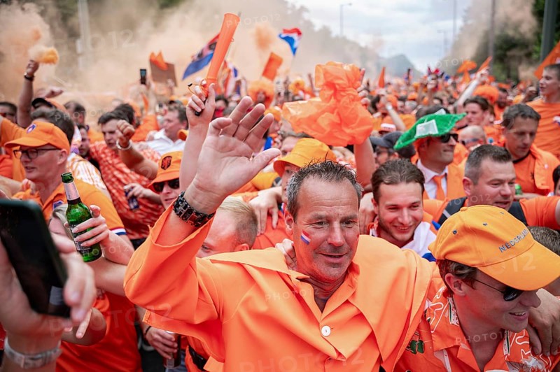 06/07/2024, Berlin, Germany, Europe, Fans of the Dutch national football team celebrate on a fan walk in front of the quarter-final match against Turkey during the European Football Championship UEFA EURO 2024