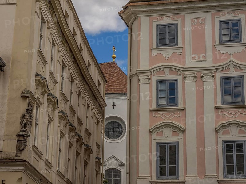 Historic buildings with ornate facades in a narrow alleyway in the historic town centre, Dürnstein, Wachau, Danube, Austria