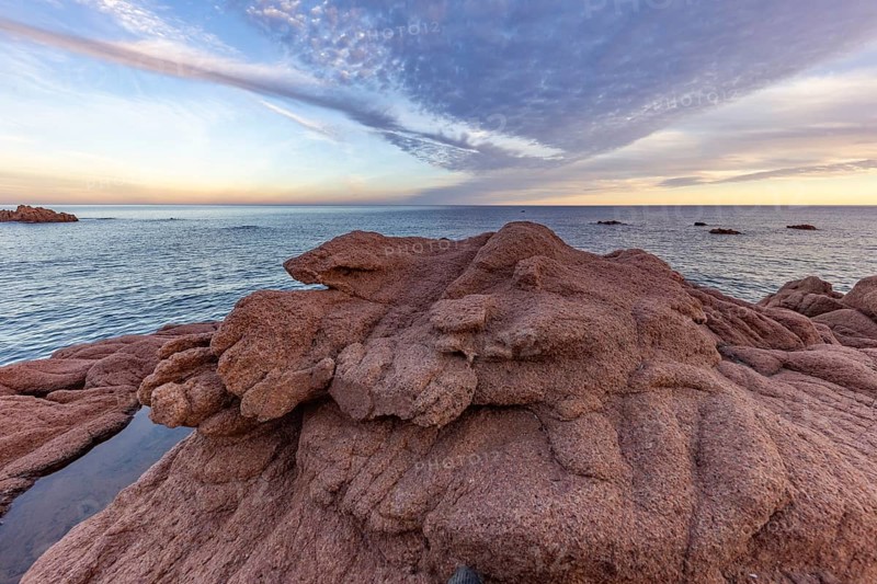 Coastal landscape with bizarre red rocks and sea view, Spiaggia di Cala E'Luas, Ogliastra, Sardinia, Italy